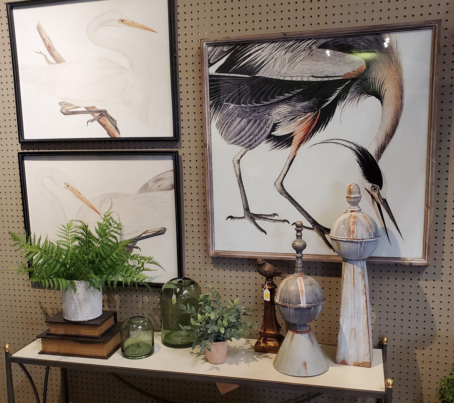 Unique framed bird prints with a selection of rustic home decor and green glass vases